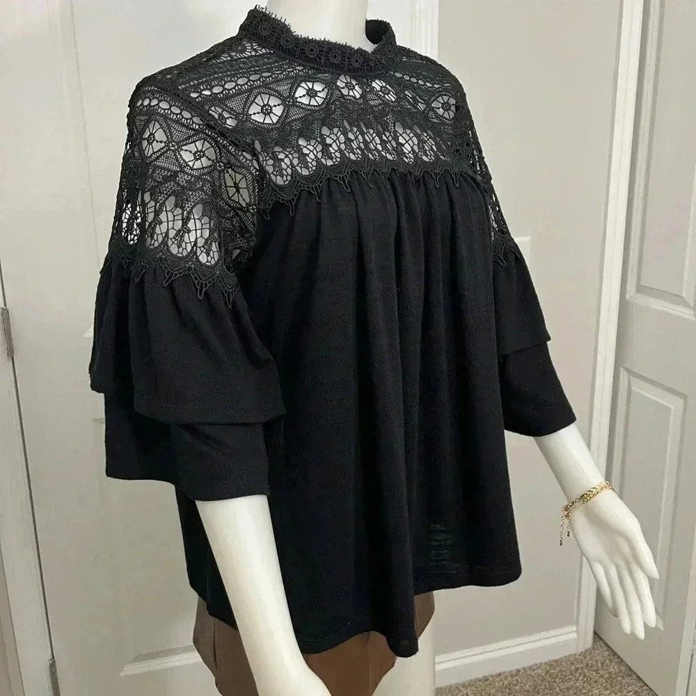 Hannah 3/4 sleeve lacy ruffle sleeve top size Medium